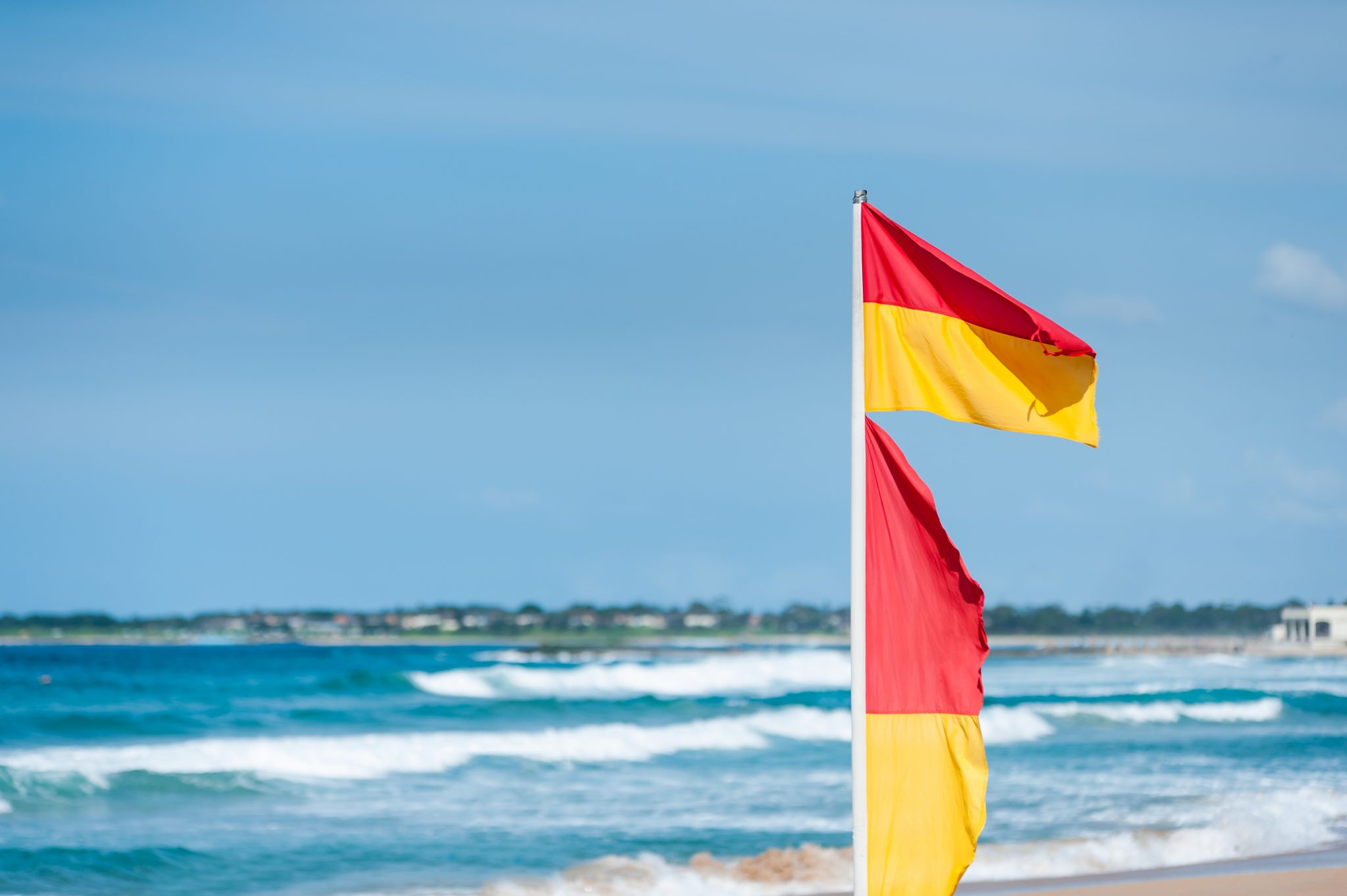 One surf rescue flat blowing in on a windy beach