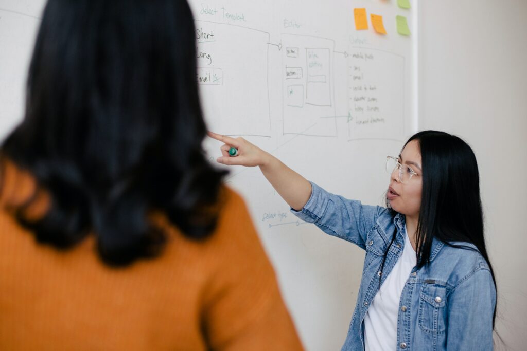 woman tutoring another woman